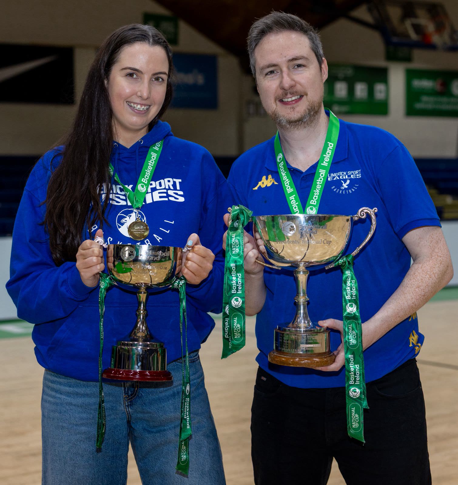 Both holding National Cup trophies