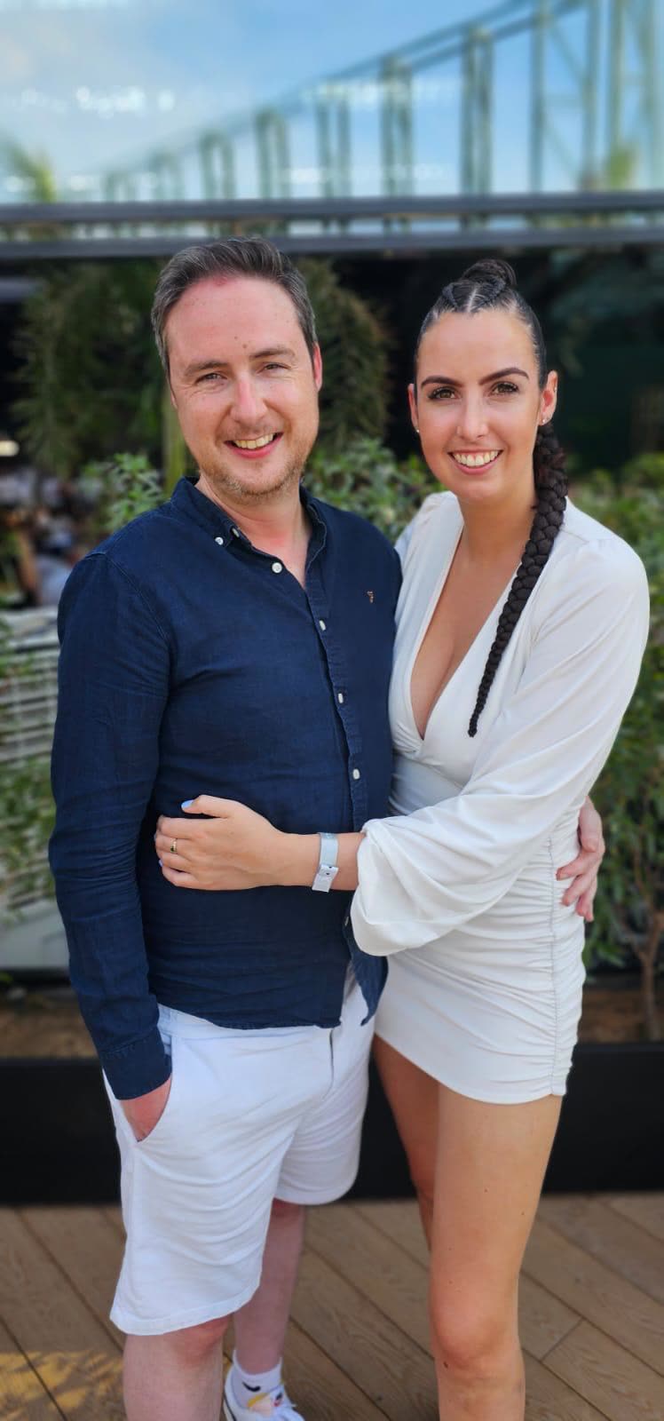Dressed up, arm in arm
